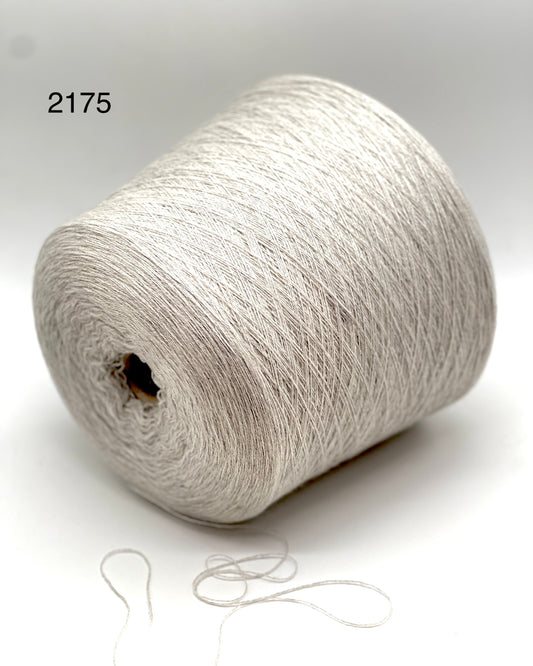 Loro Piana 100% Extra Fine Cashmere lace yarn (2/27 Nm) on a professional cone. Shown in classic neutral shades including Light Camel, Sand Melange, and Ivory. Made in Italy. Available at iDOKNiT.com.