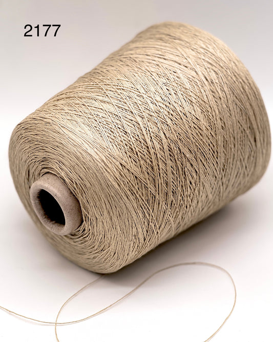 Exclusive iDOKNiT lace weight yarn, LINONE by NEW MILL Italy. 100% pure linen fiber providing 660m per 100g. Authentic Italian-made luxury plant fiber curated by iDOKNiT for breathable, high-end summer garments, available in classic natural, white, and blue shades.