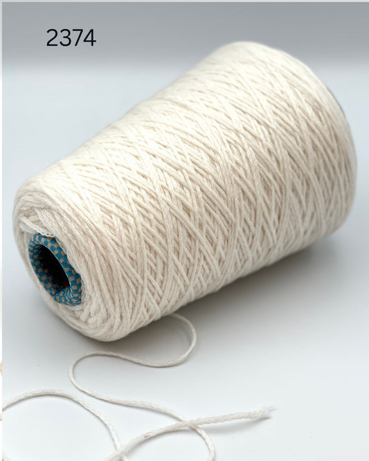 Rare CARIAGGI PIUMA 100% cashmere chainette yarn on original mill cone with original label and lofty cashmere texture.