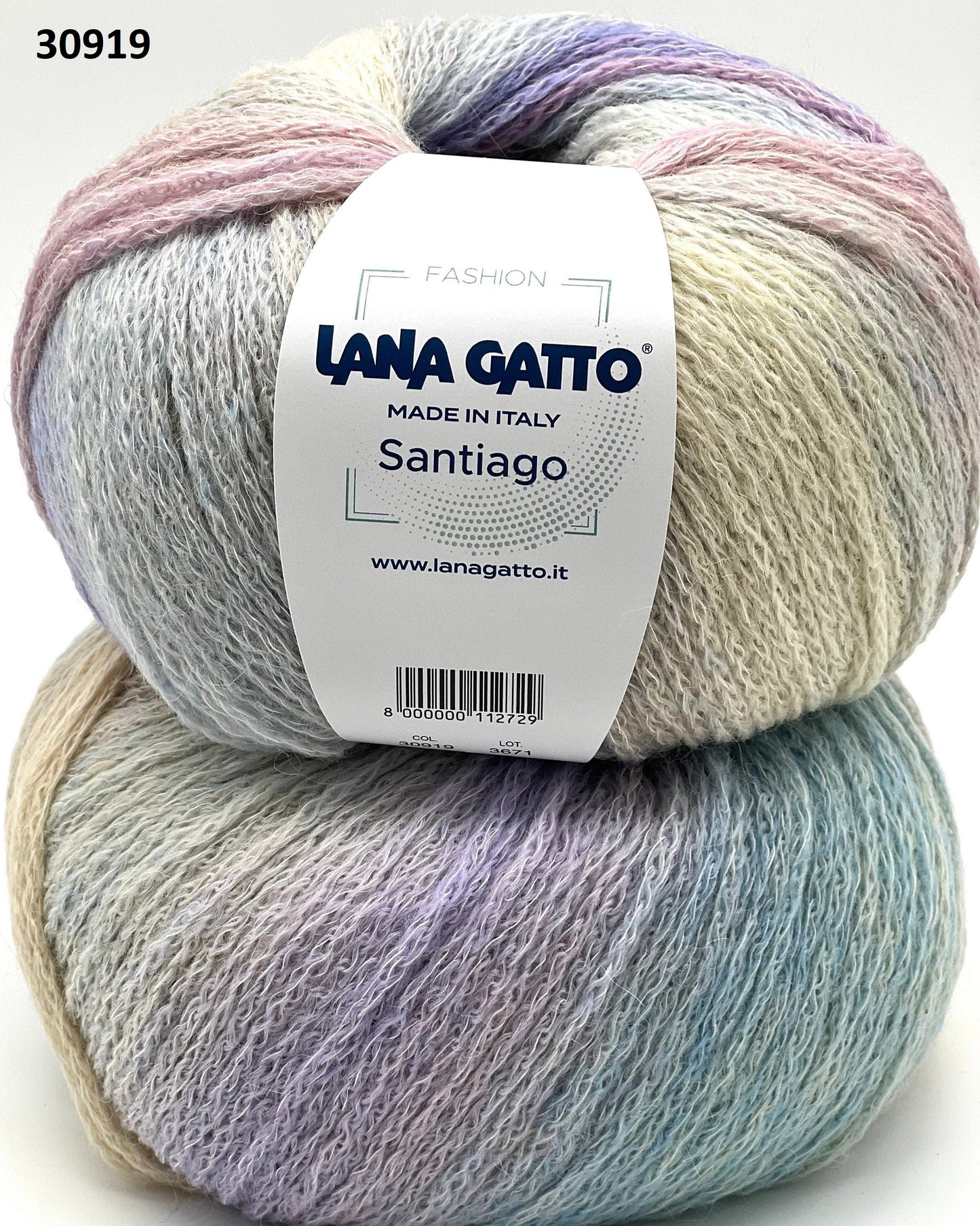 Two skeins of colorful yarn with a Lana Gatto label on a white background