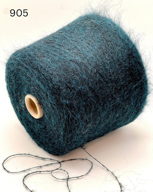 Exclusive iDOKNiT extra fine lace weight yarn, ASTRO by IGEA Italy. A luxury cloud-like blend of 67% superkid mohair, 30% polyamide, and 3% extra fine merino wool providing 1000m per 100g. Authentic Italian-made premium fiber curated by iDOKNiT for airy, delicate lace knitting, lightweight garments, and elegant multi-strand fiber blending.