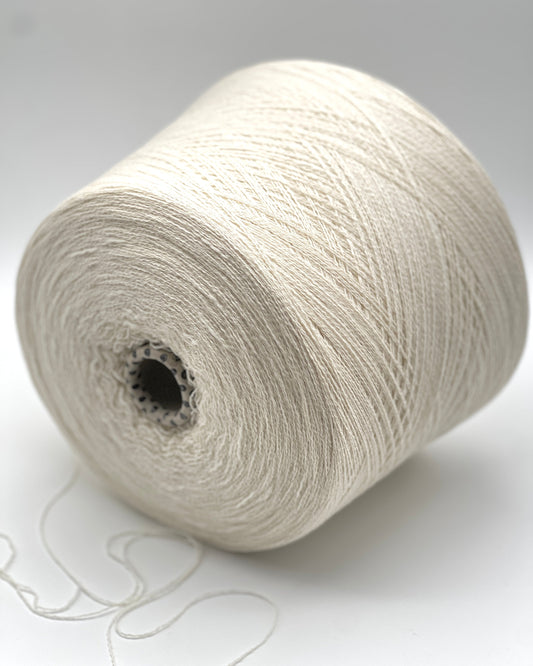 Filati Biagioli Modesto FLOCK luxury Italian yarn. This 98% cashmere blend features a unique textured crêpe or granular gimp construction. Shown on a professional cone. High-end designer yarn available at iDOKNiT.com.