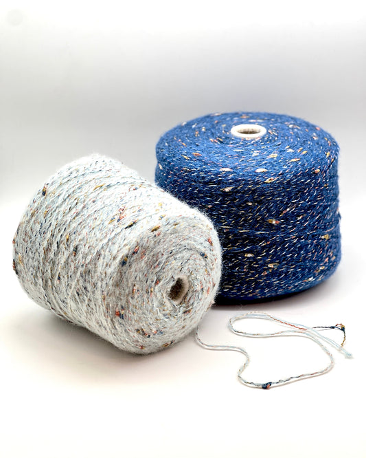 TAURUS couture yarn by RiGo, Italy — luxury aran-weight baby alpaca blend with multicolor viscose wrap and boucle “shishibriki” nubs. Sold at iDOKNiT.