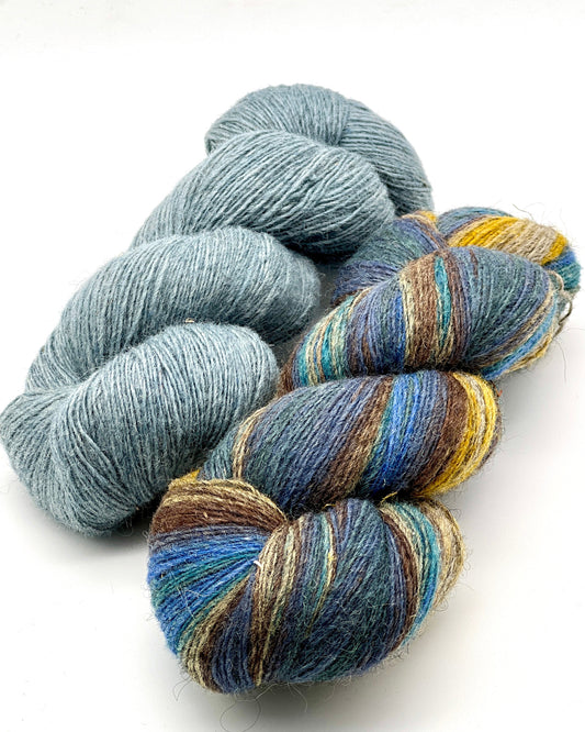 Lanolin-rich Dundaga 6.1 German Merino wool yarn spun at Paces Vilnas Fabrika, Latvia — single-ply fingering to sport weight yarn with natural warmth, rustic texture, and durability, curated by iDOKNiT.