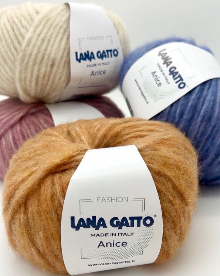 Four balls of yarn in different colors with 'Lana Gatto' labels on a white background