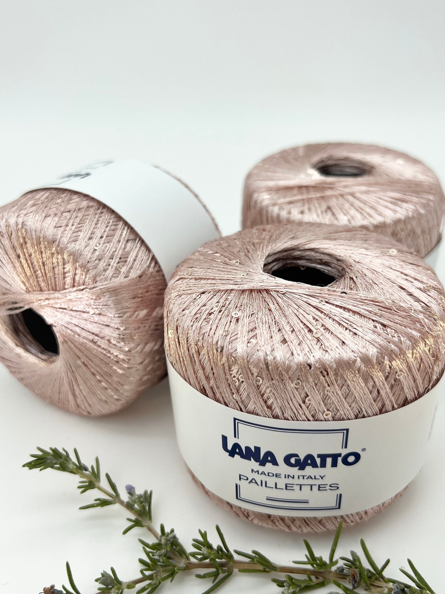 Lana Gatto Paillettes yarn in shimmering pastel tones, with delicate 2mm sequins, lightweight polyester yarn ideal for adding sparkle to knit or crochet projects. Made in Italy. 8933 rosa color.