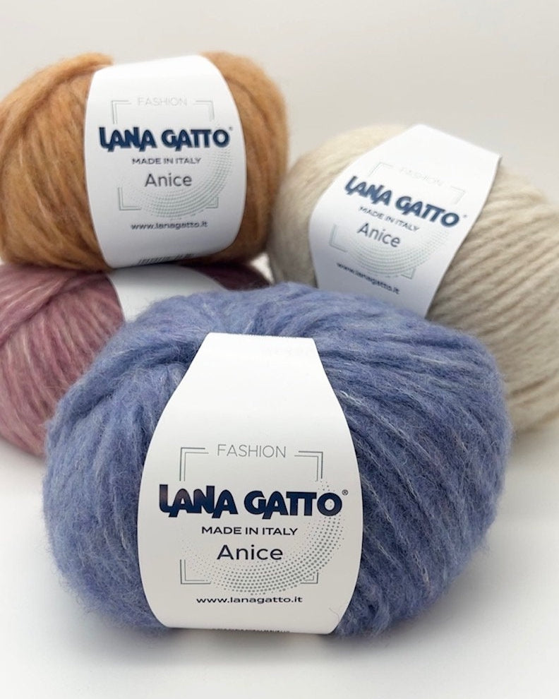Four balls of yarn in different colors with 'Lana Gatto' labels on a white background