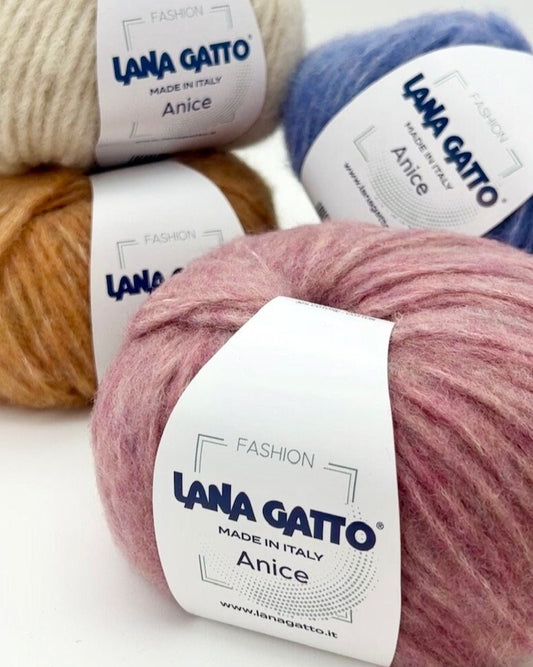 Four balls of yarn with 'Lana Gatto' labels on a white background