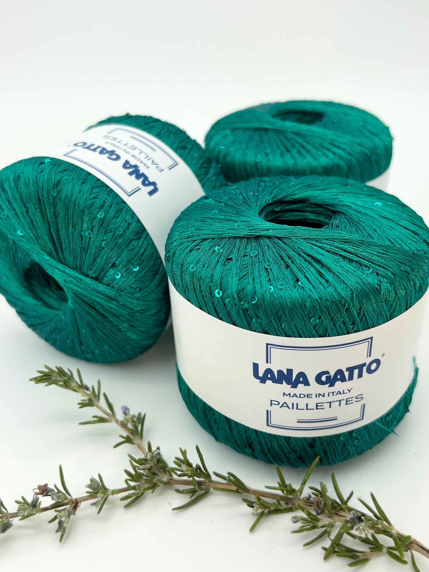Lana Gatto Paillettes yarn in shimmering pastel tones, with delicate 2mm sequins, lightweight polyester yarn ideal for adding sparkle to knit or crochet projects. Made in Italy. 8937 green color.