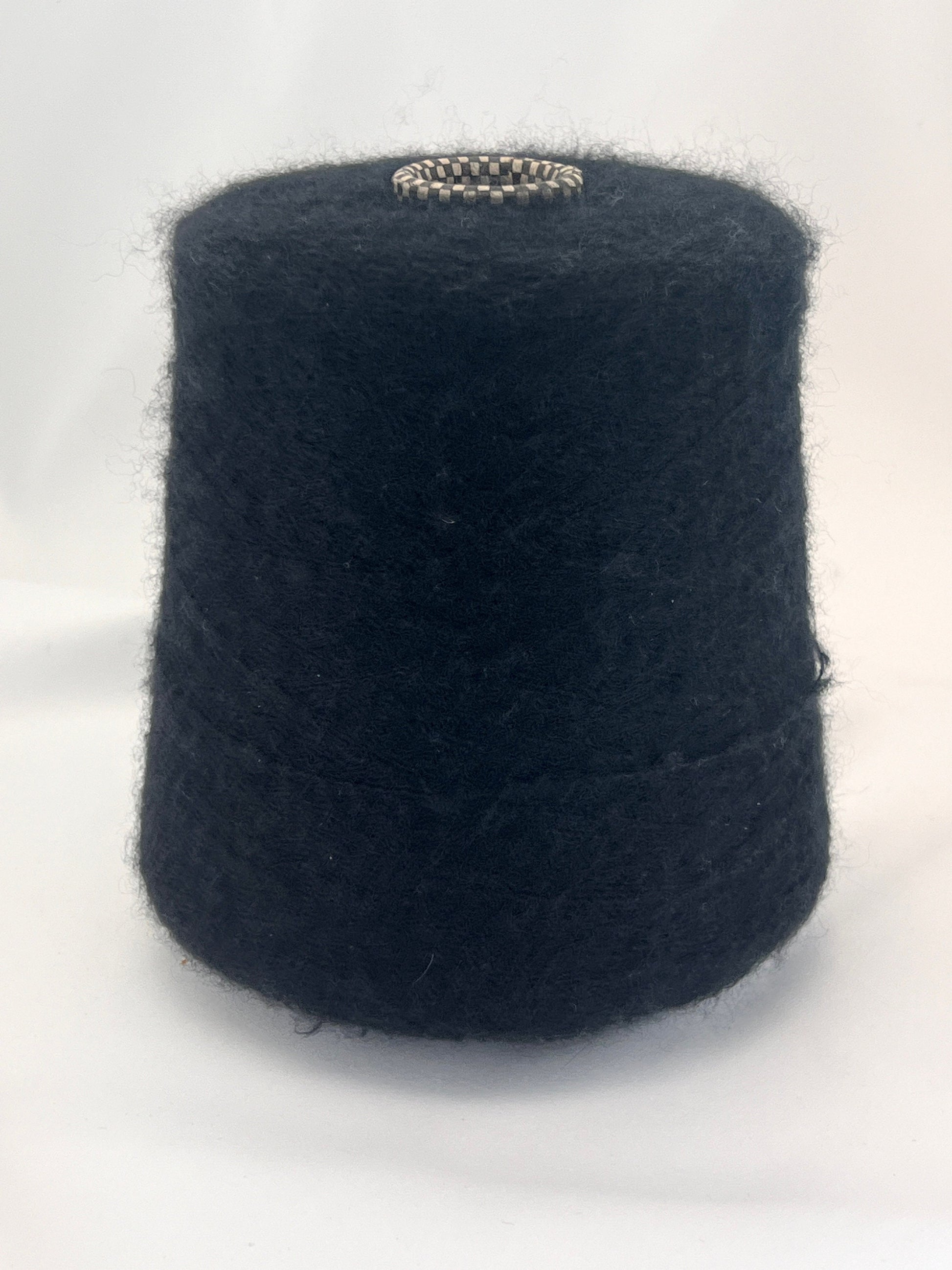 Black yarn cone on a white background