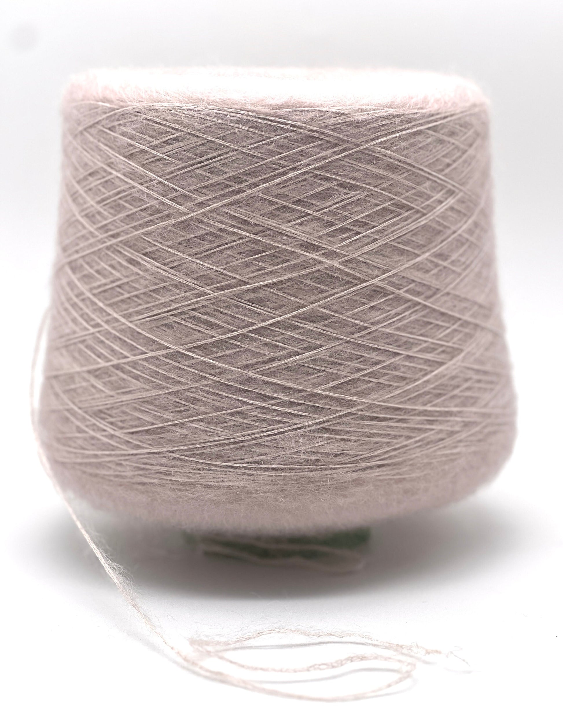 Ball of gray yarn on a white background