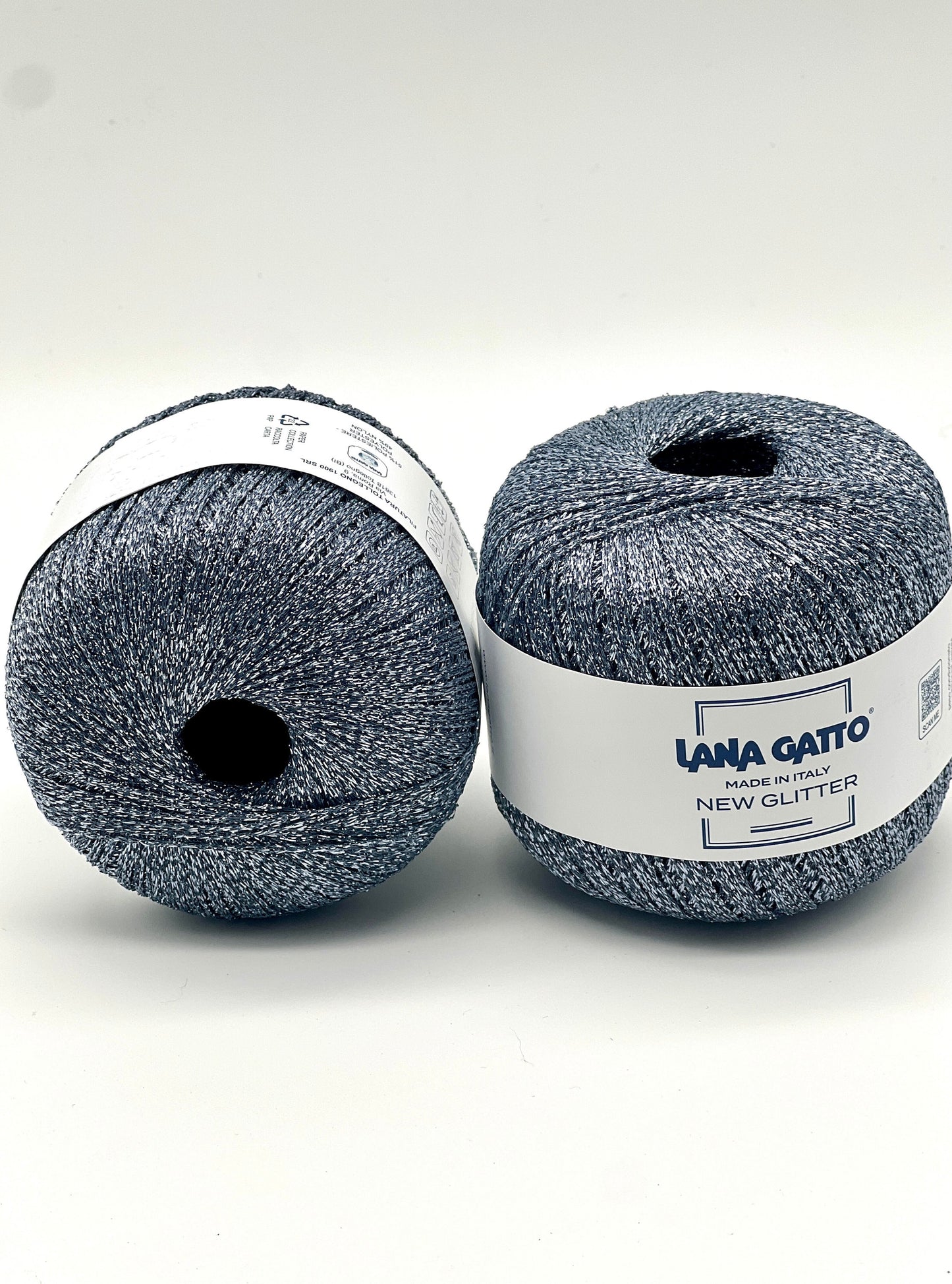 Two balls of yarn with 'Lana Gato' labels on a white background