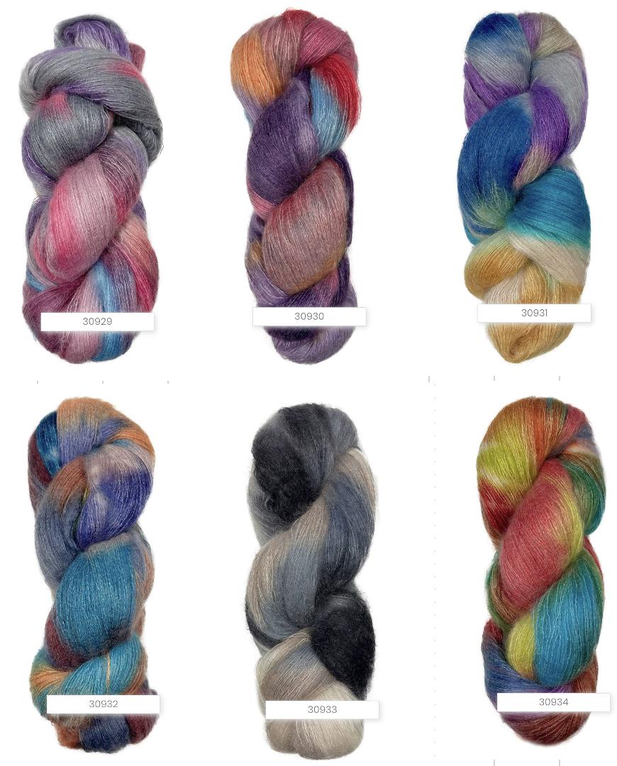 Six skeins of multicolored yarn on a white background