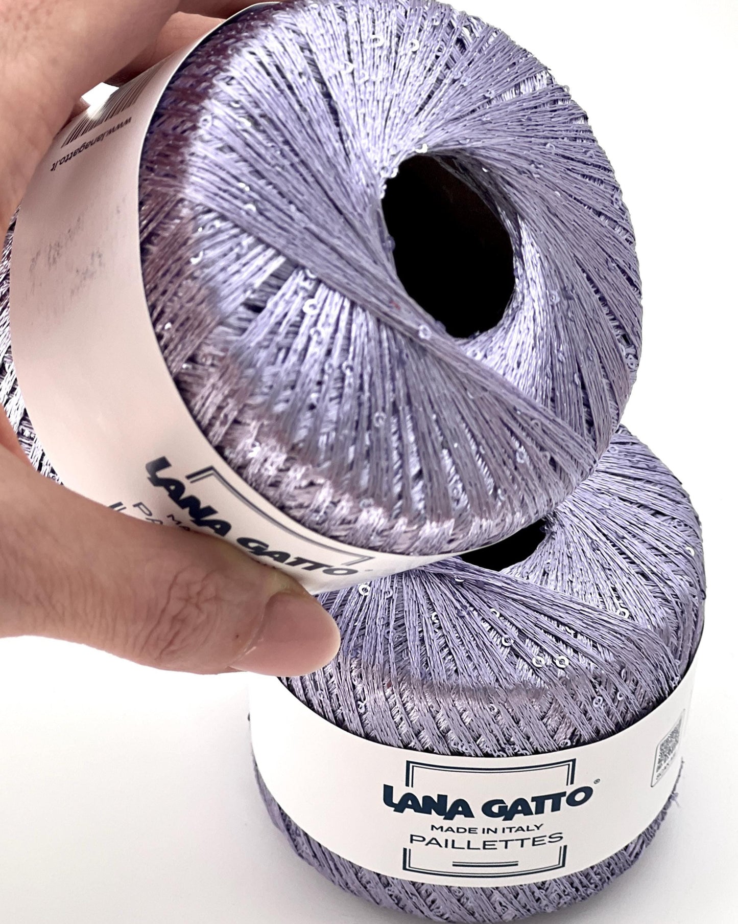 Lana Gatto Paillettes yarn in shimmering pastel tones, with delicate 2mm sequins, lightweight polyester yarn ideal for adding sparkle to knit or crochet projects. Made in Italy. 30787 Lavender Color.