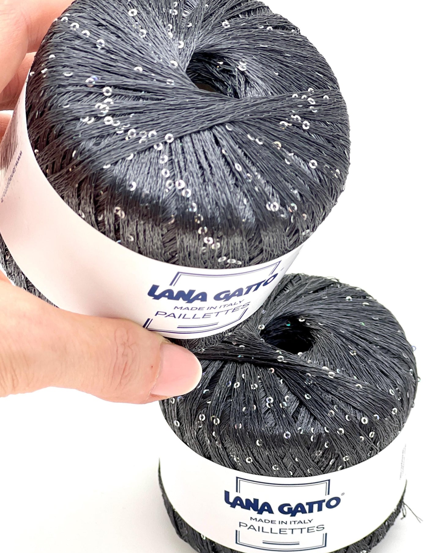 Lana Gatto Paillettes yarn in shimmering pastel tones, with delicate 2mm sequins, lightweight polyester yarn ideal for adding sparkle to knit or crochet projects. Made in Italy. 30103 Dark grey color.