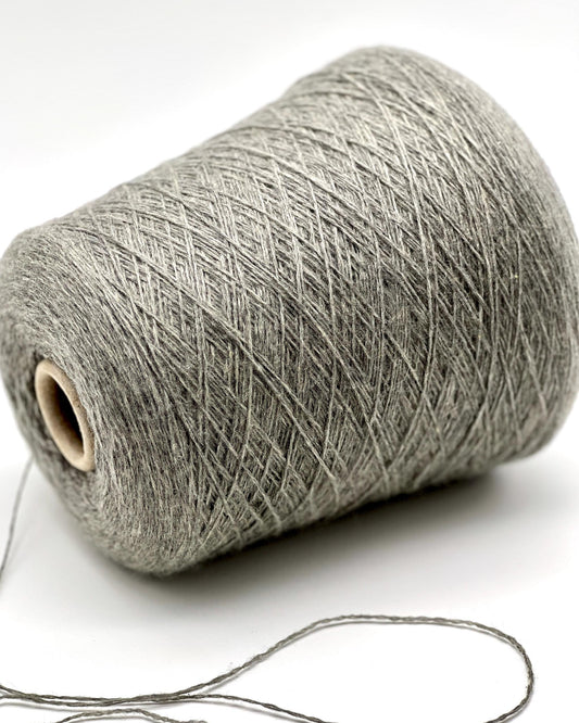 Luxury Italian cashmere yarn CASH LIGHT FINE 850m
100 percent cashmere lace light fingering yarn cone Italy
soft Italian cashmere yarn for sweaters shawls and scarves
premium cashmere yarn close up texture detail
luxury knitting weaving crochet cashmere yarn cone