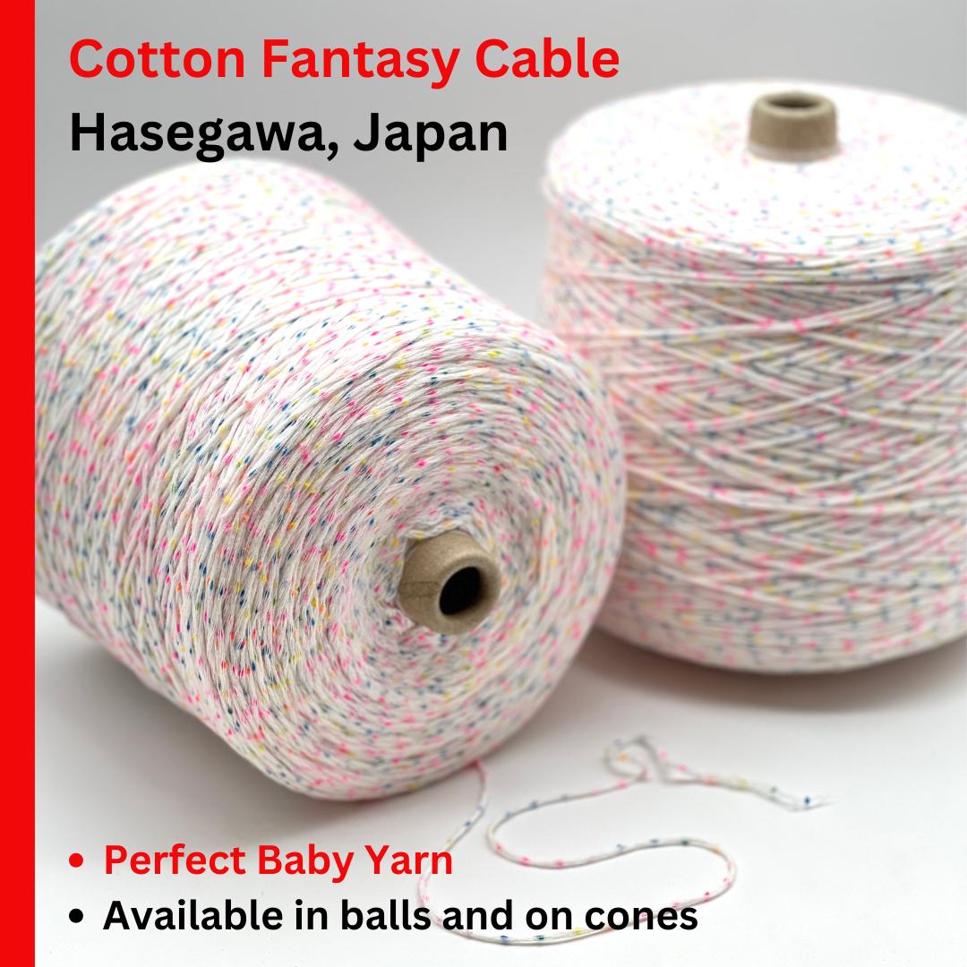 Two spools of Cotton Fantasy Cable yarn with text about Hasegawa, Japan.