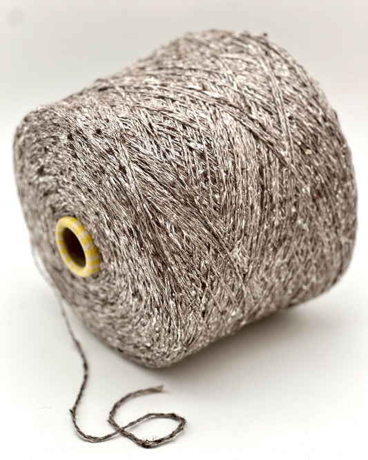Spool of gray yarn on a white background