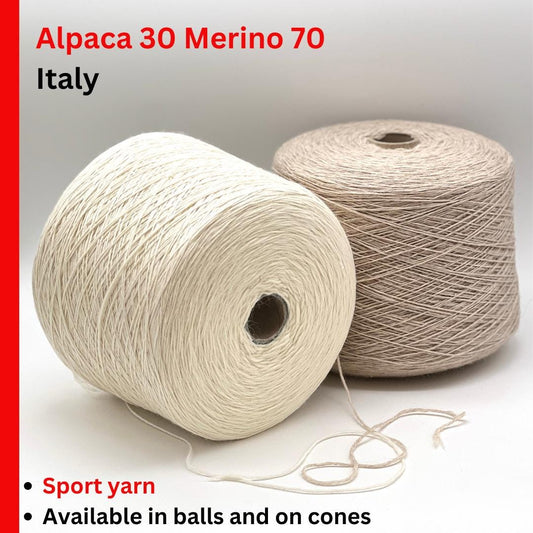 Two spools of yarn labeled 'Alpaca 30 Merino 70 Italy' on a gray background.