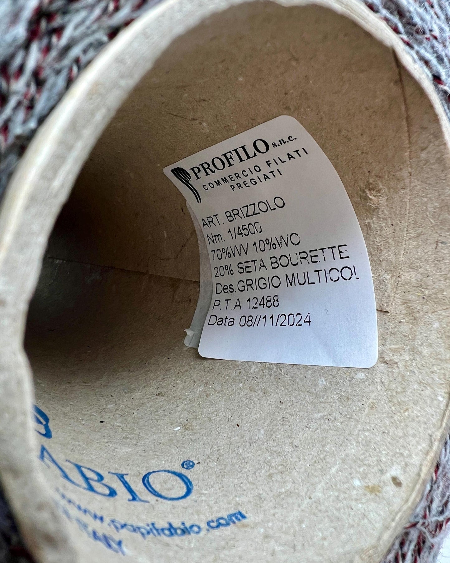 Close-up of a label inside a woven product with 'Profilo' branding.