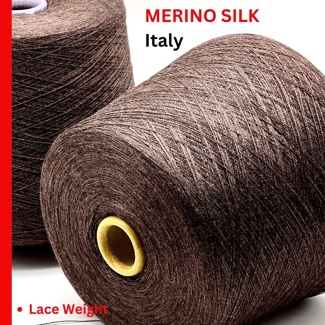 Two spools of Merino Silk yarn with 'Merino Silk, Italy" on a white background