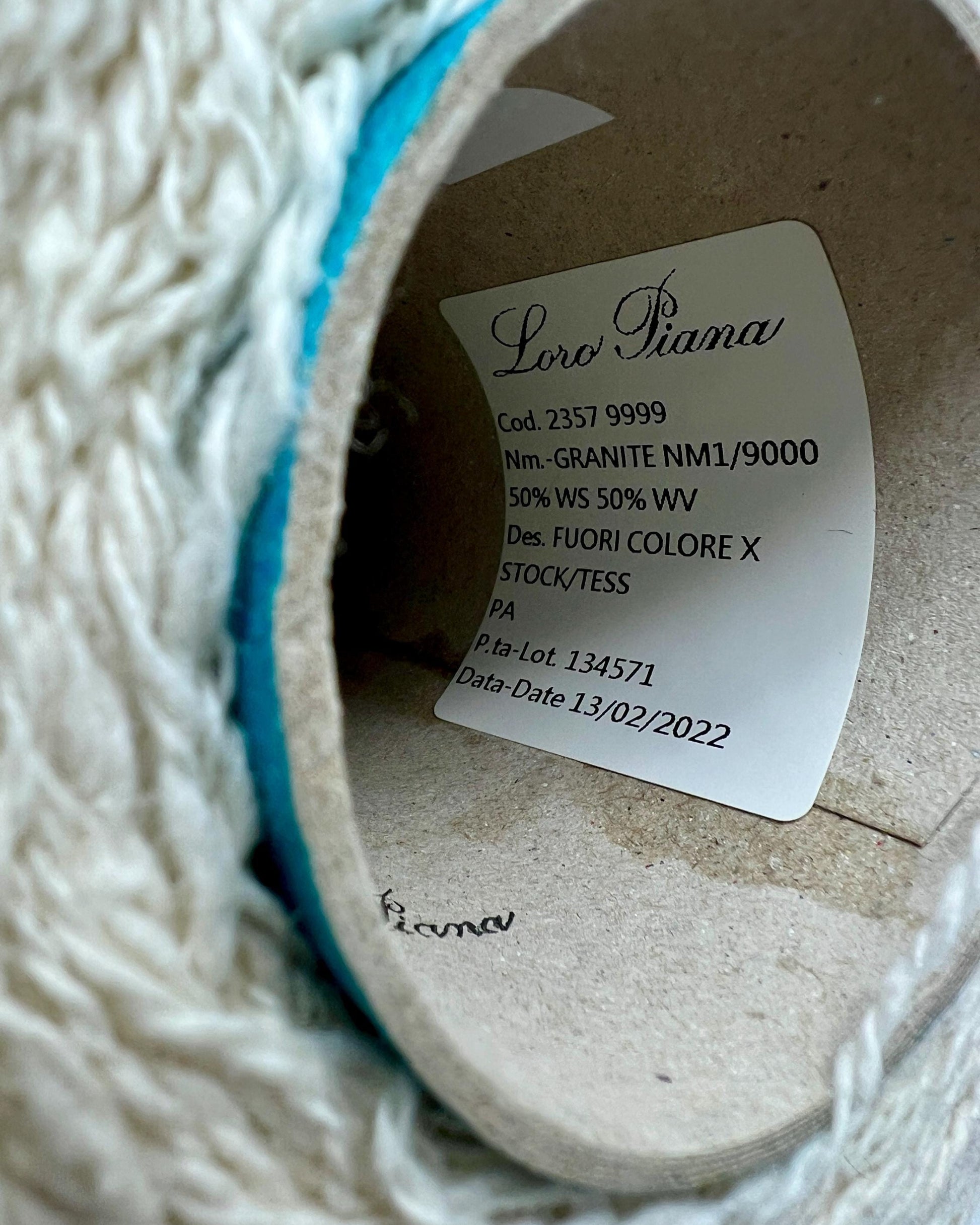 Close-up of a Loro Piana label inside a woven product.