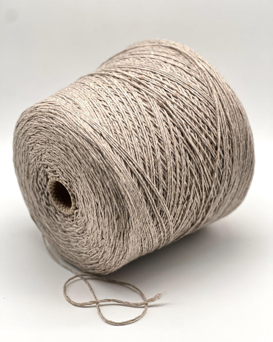 Exclusive iDOKNiT DK weight cashmere yarn, Cashmere Donegal by Cariaggi Italy. 100% pure cashmere featuring a sophisticated Donegal tweed texture, Nm 2.000, providing 200m per 100g. Authentic Italian-made luxury fiber in 1540 Stone Beige Melange, curated by iDOKNiT for exceptionally soft, high-end sweaters and winter accessories.