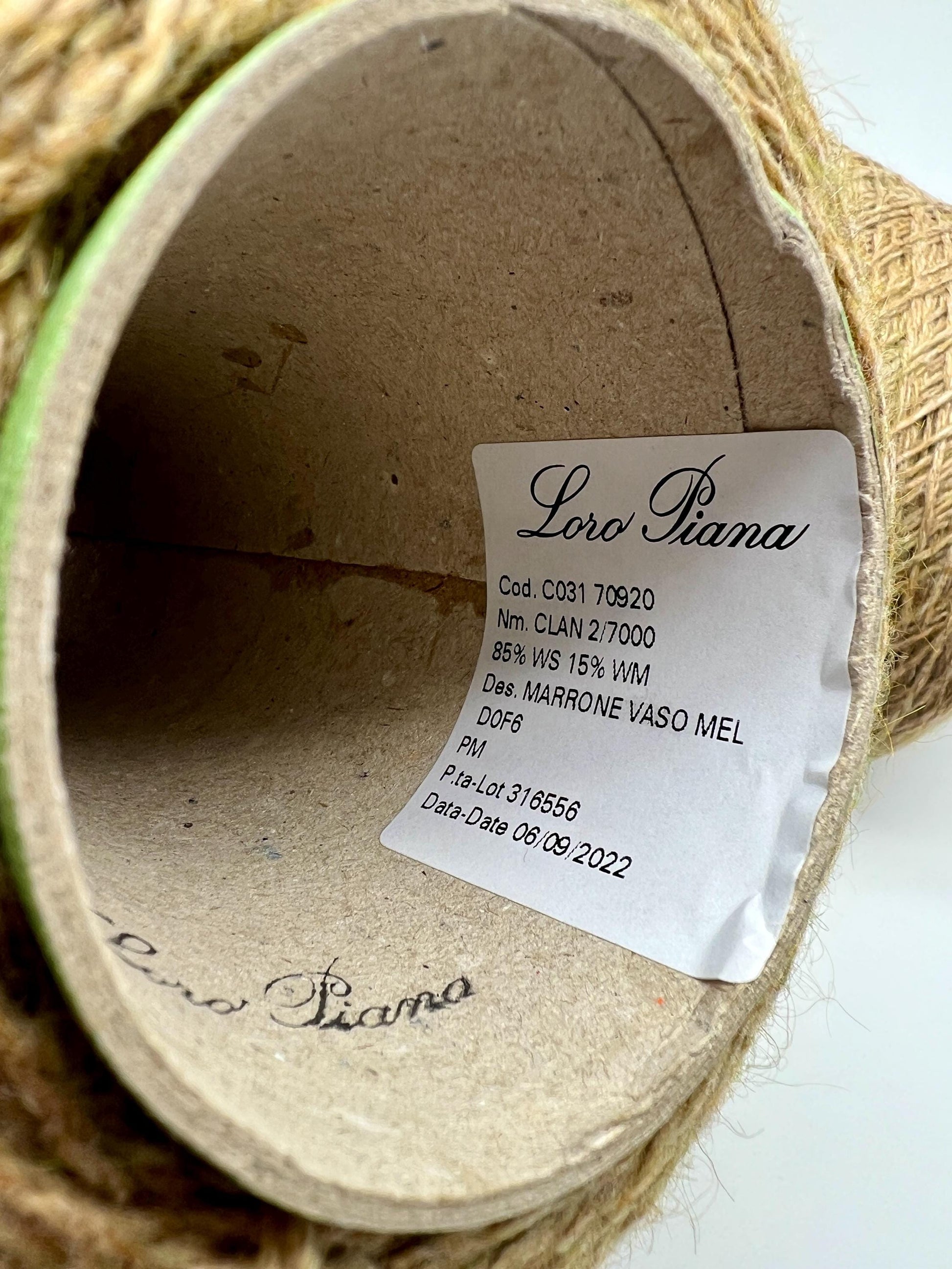 Loro Piana label inside a woven basket