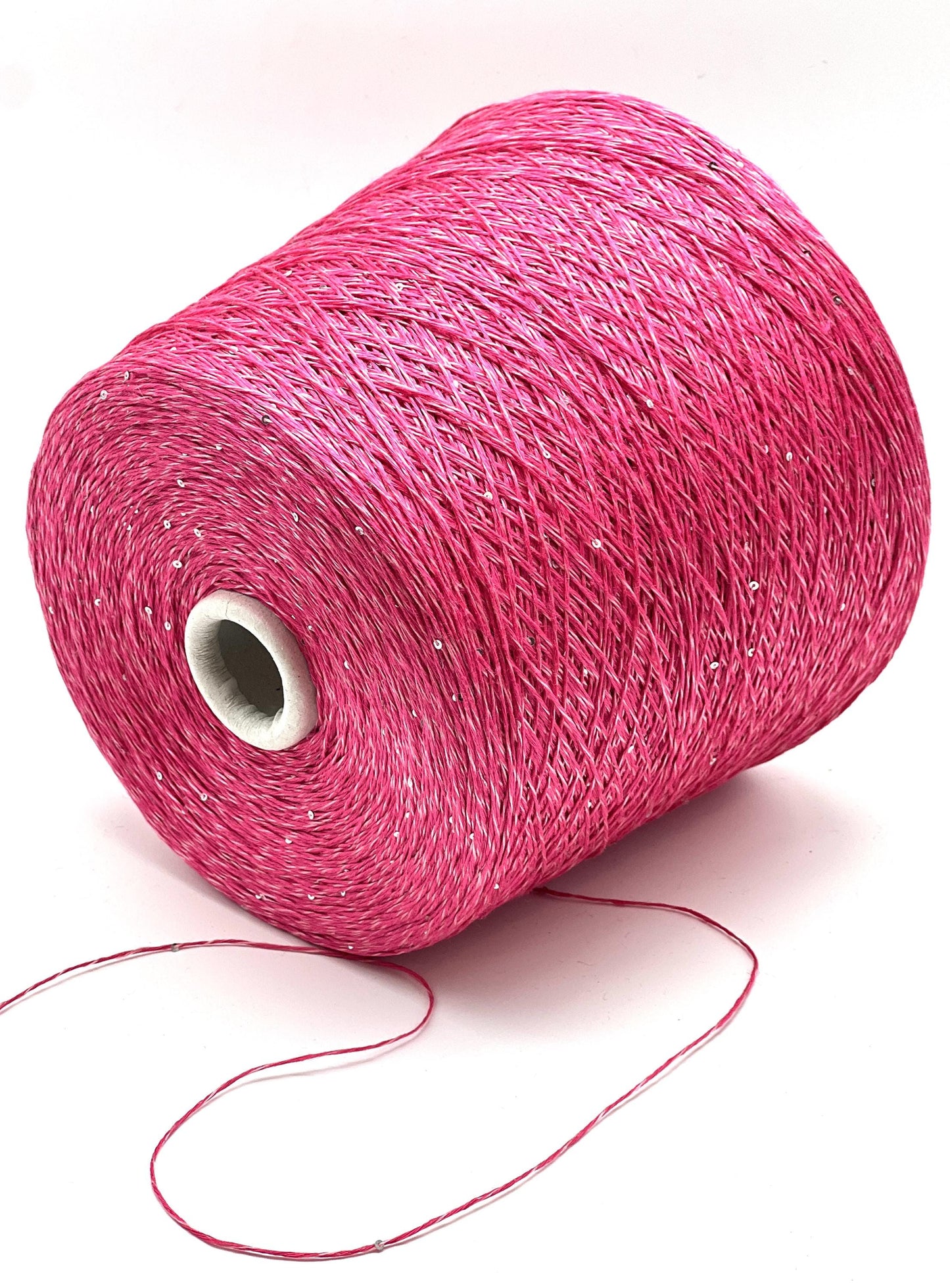 SAINT TROPEZ luxury yarn by RiGo, Italy – fingering weight blend of 80% linen, 15% silk, and 5% silver paillettes. Light, breathable, with a luminous sparkle. Ideal for elegant warm-weather knits.. Resberry pink color.