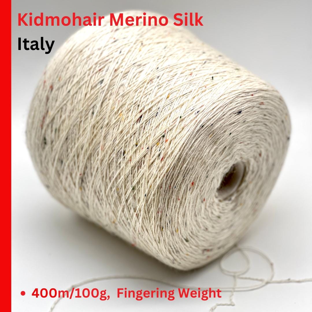 Spool of Kidmohair Merino Silk from Italy on a white background