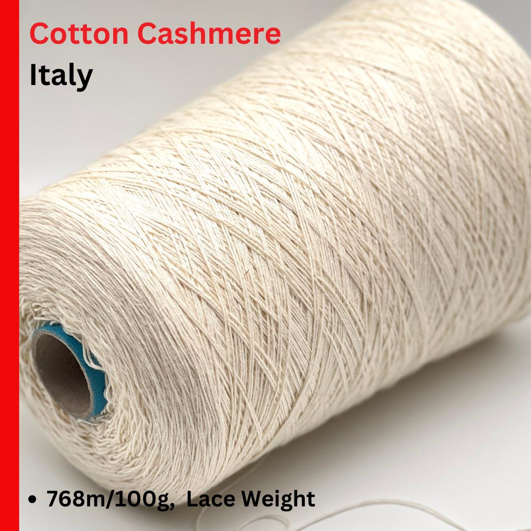 Roll of cotton cashmere yarn with text indicating origin and specifications.