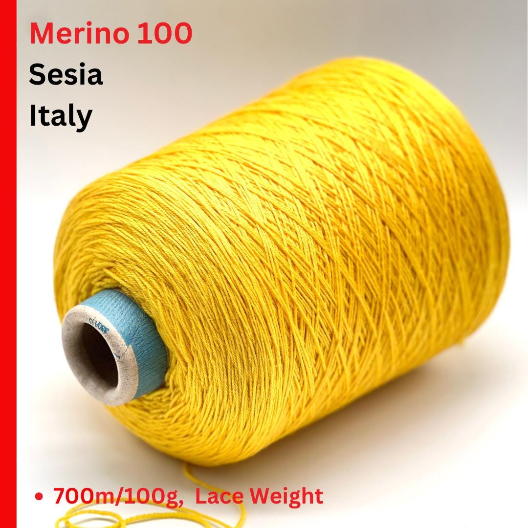 Yellow spool of Merino yarn with text indicating origin and details on a white background