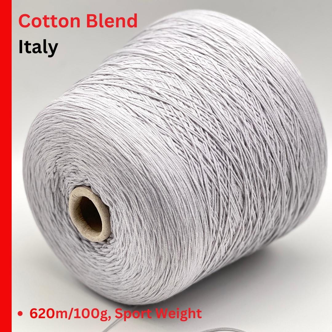 Spool of cotton blend yarn with 'Cotton Blend Italy' text on a white background