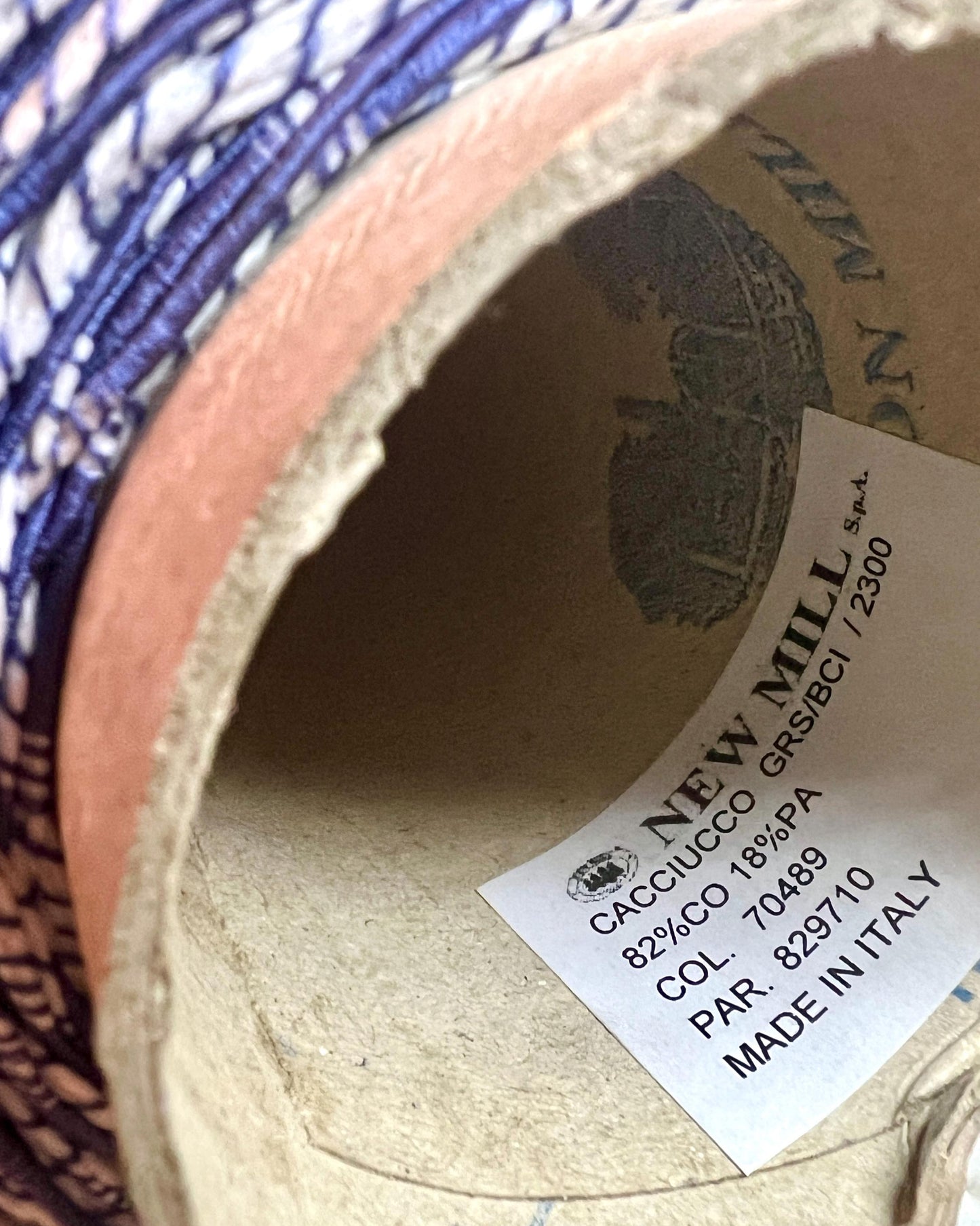 Close-up of a shoe with a label showing 'Caccucci' brand and 'Made in Italy'.