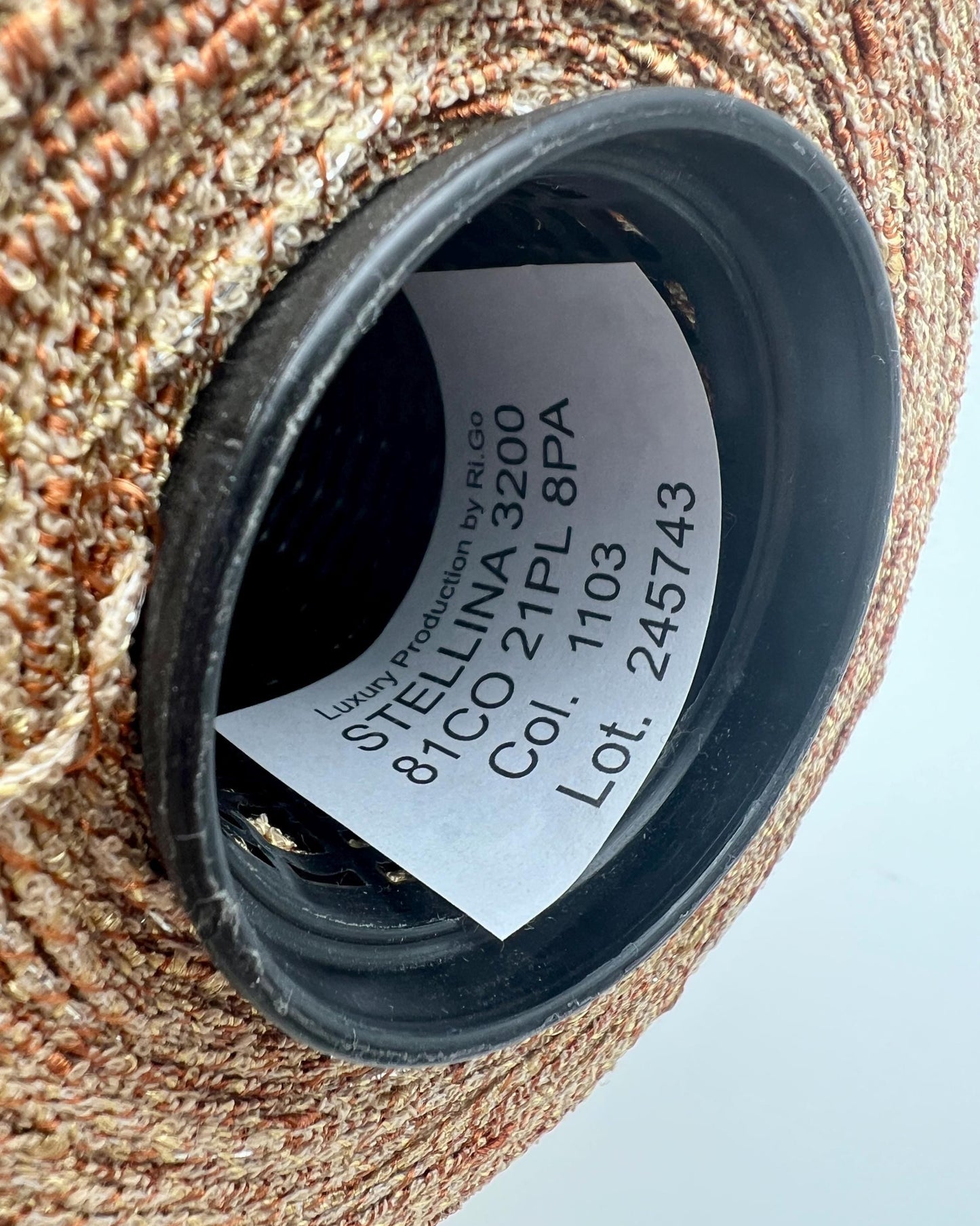 Close-up of a textured surface with a label on a white background
