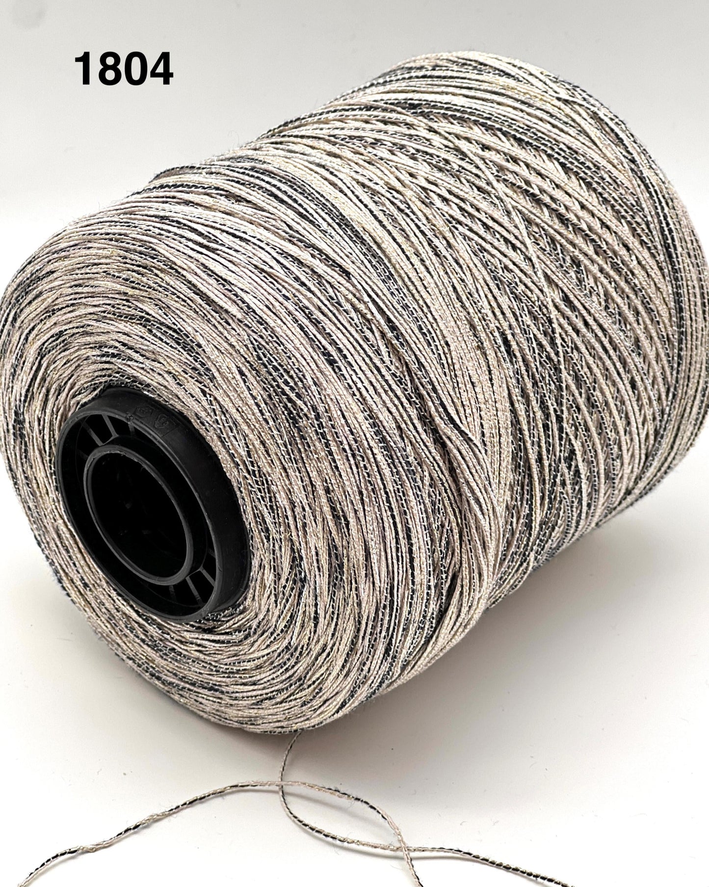 Spool of thread labeled '1804' on a white background