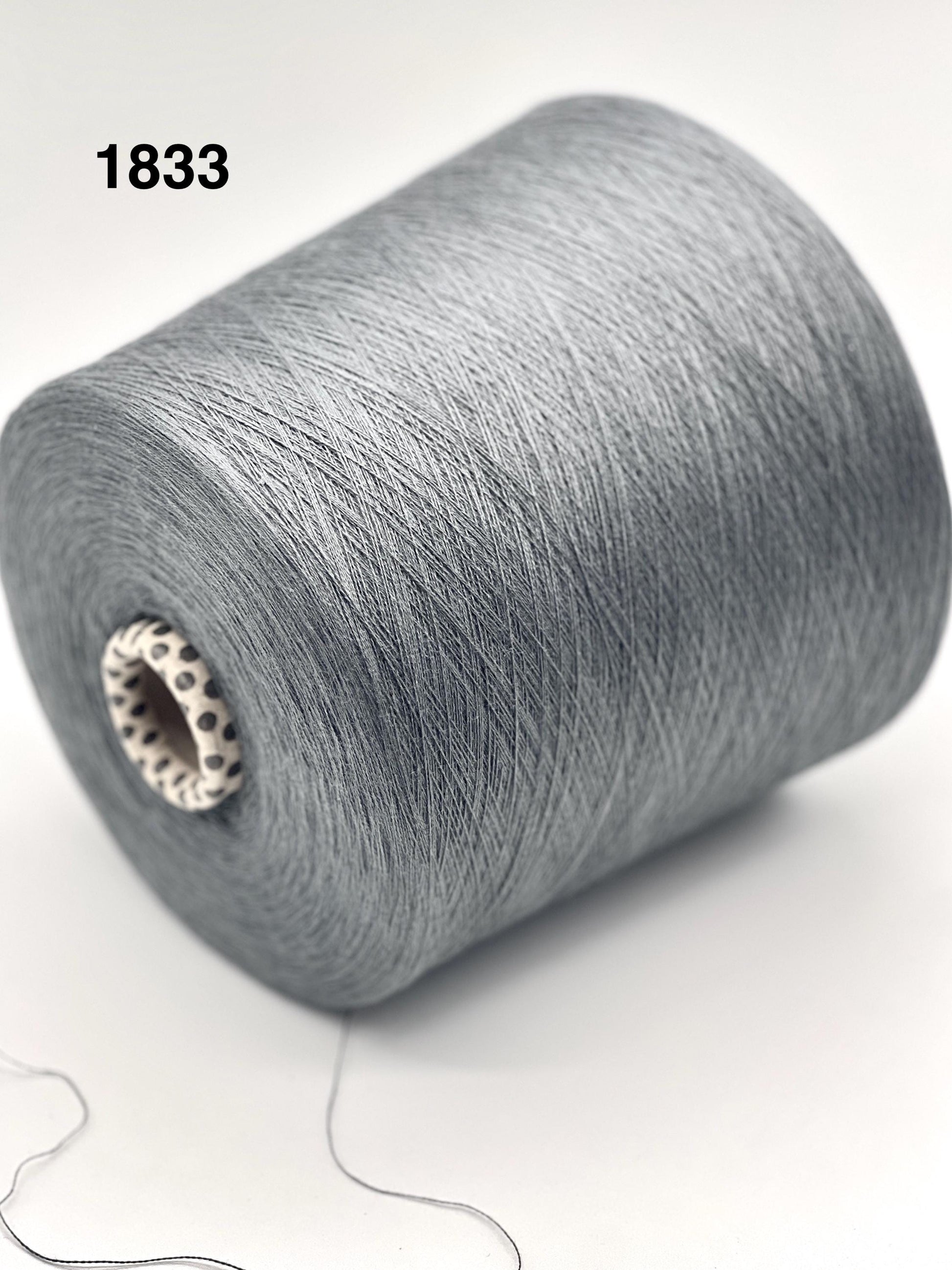 Gray spool of yarn on a white background with number 1833.