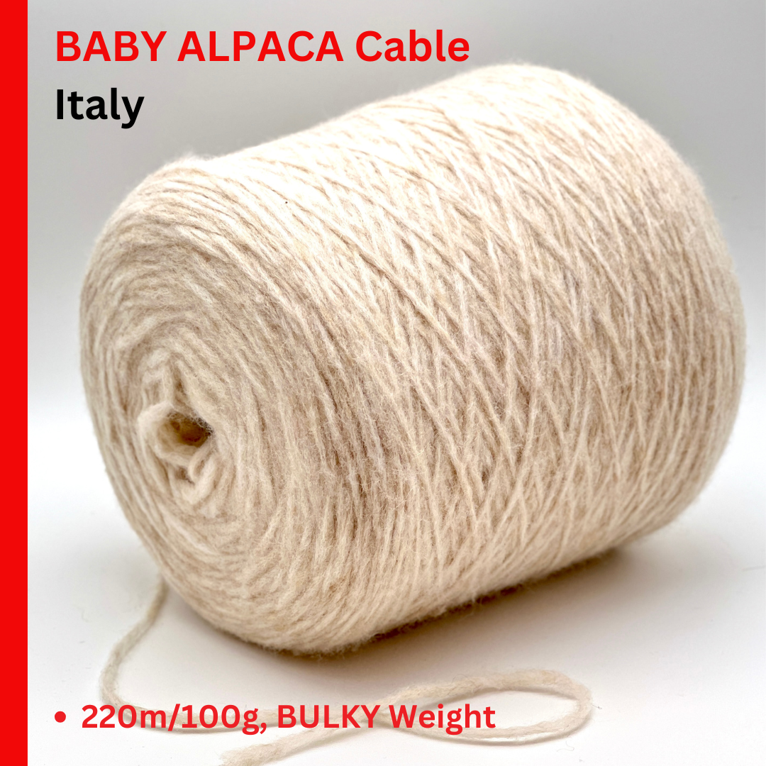 Ball of yarn labeled 'BABY ALPACCA Cable Italy' with product details.