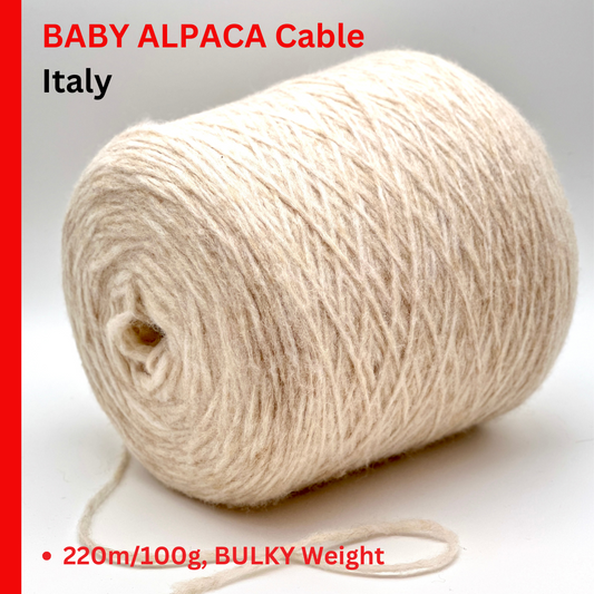 Ball of yarn labeled 'BABY ALPACCA Cable Italy' with product details.