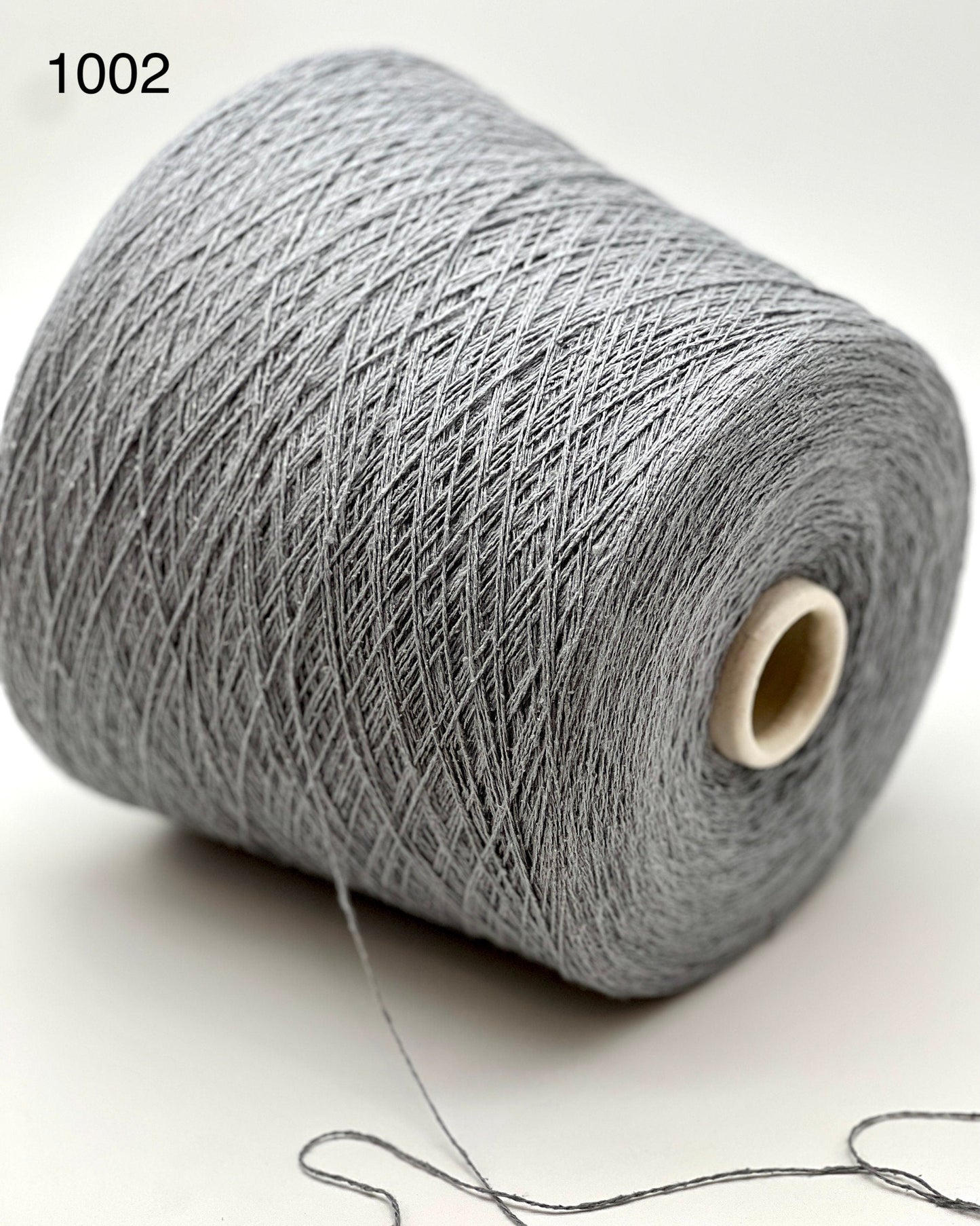 Shop RiGo Bourette Silk at iDOKNiT. 100% Italian silk, 750m per 100g. Natural matte character and rustic texture for luxury summer knitting. Ships from CA!