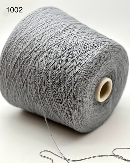 Shop RiGo Bourette Silk at iDOKNiT. 100% Italian silk, 750m per 100g. Natural matte character and rustic texture for luxury summer knitting. Ships from CA!