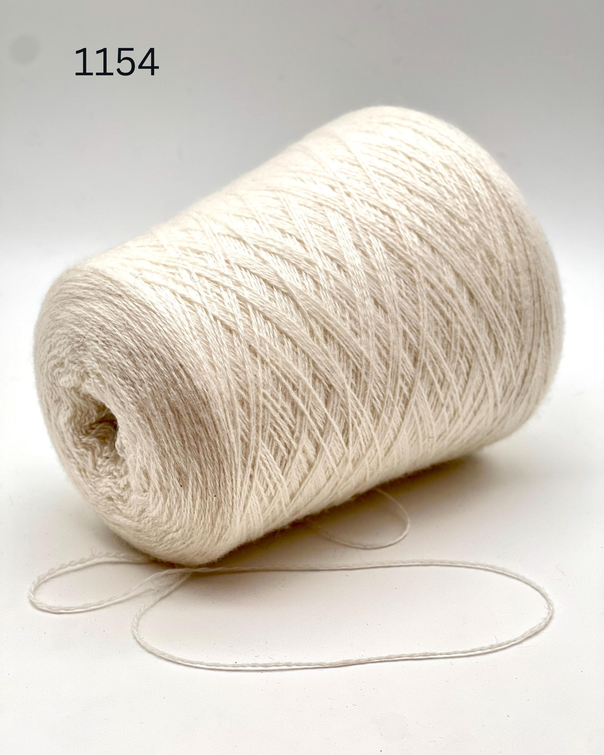 COARSEHAIR 2/11 cashmere yarn luxury Italian yarn
100 percent cashmere lace fingering yarn 550m per 100g
Soft luxury cashmere yarn for sweaters shawls and scarves
Italian cashmere cone yarn close up texture detail
COARSEHAIR 2/11 lightweight wearable cashmere yarn