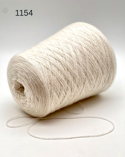 COARSEHAIR 2/11 cashmere yarn luxury Italian yarn
100 percent cashmere lace fingering yarn 550m per 100g
Soft luxury cashmere yarn for sweaters shawls and scarves
Italian cashmere cone yarn close up texture detail
COARSEHAIR 2/11 lightweight wearable cashmere yarn