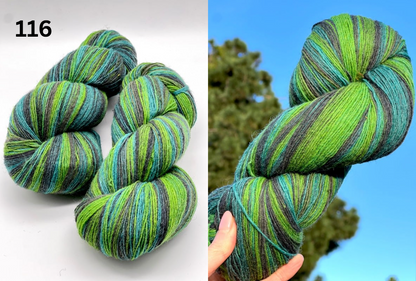 Small-batch dyed skeins of 100% Latvian Dark-Headed Sheep Wool in varied earth tones and vibrant multi-colors like Green-Brown striped 052. The rustic single-ply texture is shown in detail, including images of the sheep and the historic Paces Vilnas Fabrika origin. Available at iDOKNiT.com.