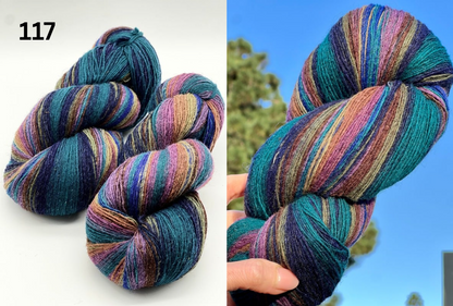 Small-batch dyed skeins of 100% Latvian Dark-Headed Sheep Wool in varied earth tones and vibrant multi-colors like Green-Brown striped 052. The rustic single-ply texture is shown in detail, including images of the sheep and the historic Paces Vilnas Fabrika origin. Available at iDOKNiT.com.