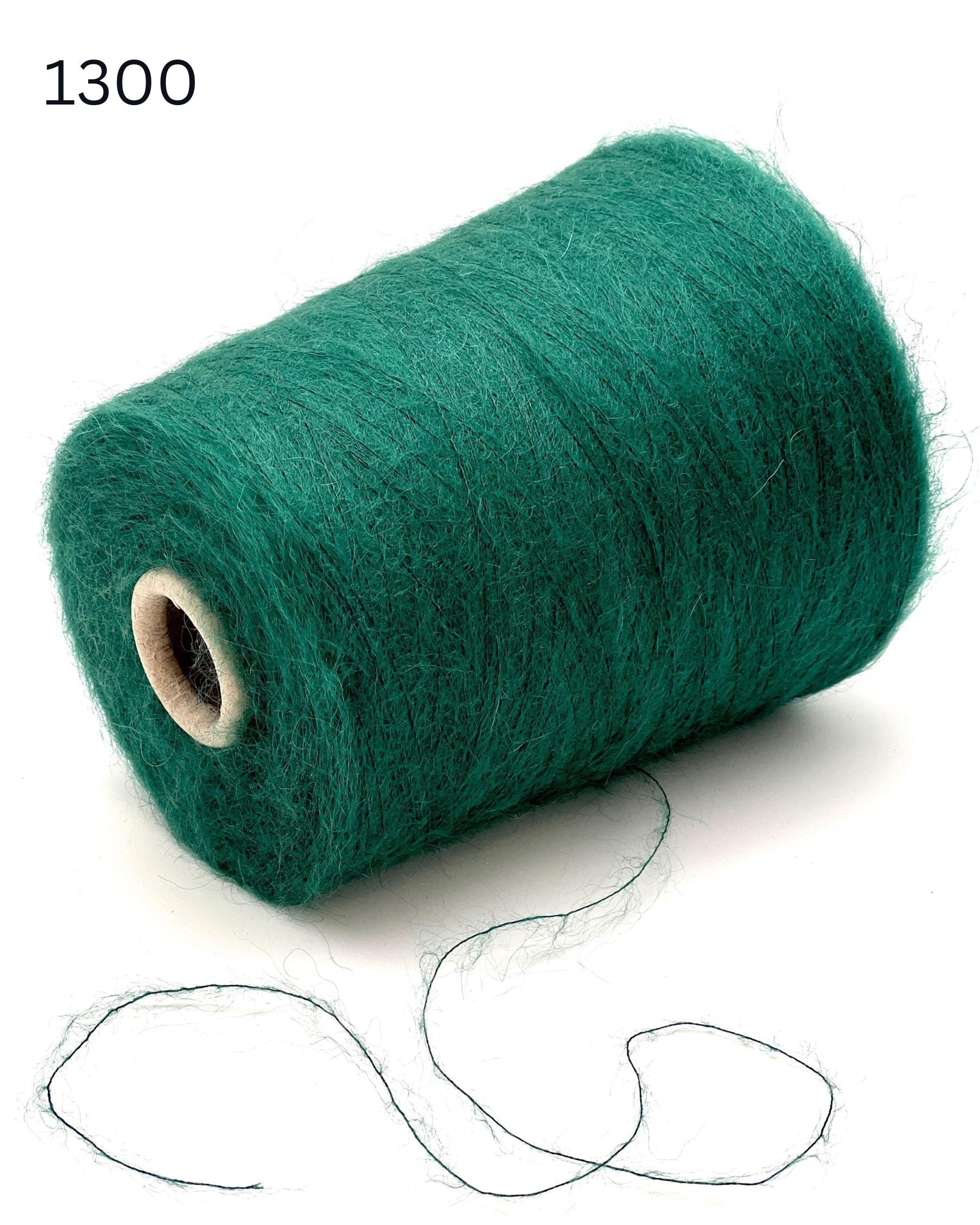 Exclusive iDOKNiT extra fine lace weight yarn, AURORA 100 by Ilaria Italy. A luxury cloud-like brushed mohair blend of 67% superkid mohair, 30% polyamide, and 3% extra fine merino wool providing 1000m per 100g. Authentic Italian-made premium fiber curated by iDOKNiT for airy standalone knitting, delicate lace shawls, and rich multi-strand garment blending.