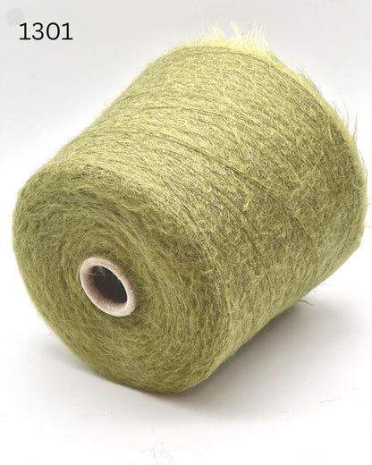 Exclusive iDOKNiT extra fine lace weight yarn, AURORA 100 by Ilaria Italy. A luxury cloud-like brushed mohair blend of 67% superkid mohair, 30% polyamide, and 3% extra fine merino wool providing 1000m per 100g. Authentic Italian-made premium fiber curated by iDOKNiT for airy standalone knitting, delicate lace shawls, and rich multi-strand garment blending.