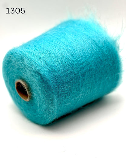 Exclusive iDOKNiT extra fine lace weight yarn, AURORA 100 by Ilaria Italy. A luxury cloud-like brushed mohair blend of 67% superkid mohair, 30% polyamide, and 3% extra fine merino wool providing 1000m per 100g. Authentic Italian-made premium fiber curated by iDOKNiT for airy standalone knitting, delicate lace shawls, and rich multi-strand garment blending.