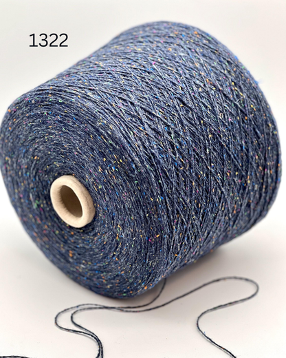 Profilo TULIP colorful tweed yarn made in Italy
Luxury Italian merino silk cotton tweed yarn close up
Soft tweed lace yarn 700m per 100g for sweaters and shawls
Italian tweed yarn with multicolor flecks
TULIP merino silk cotton yarn with refined tweed texture detail