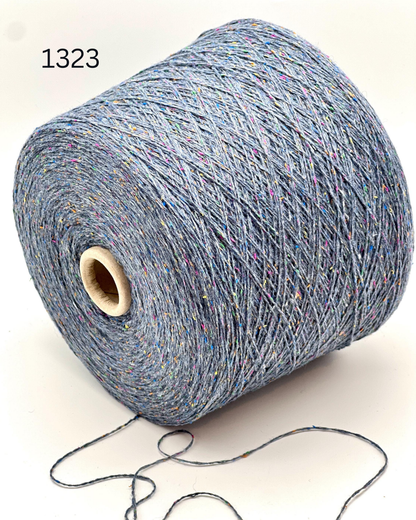 Profilo TULIP colorful tweed yarn made in Italy
Luxury Italian merino silk cotton tweed yarn close up
Soft tweed lace yarn 700m per 100g for sweaters and shawls
Italian tweed yarn with multicolor flecks
TULIP merino silk cotton yarn with refined tweed texture detail